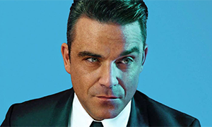 La moglie di Robbie Williams fa vedere il sedere del marito sui social