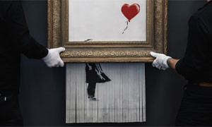 Venduto a 22 milioni Banksy 'semidistrutto'