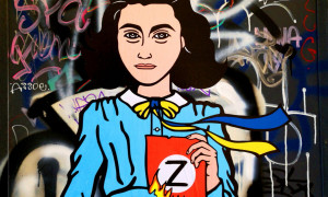 Anna Frank brucia la &quot;Z&quot; delle truppe di Putin: la nuova opera di street art a Milano