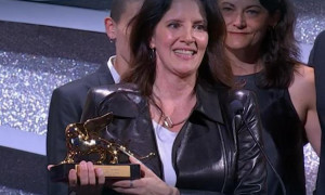 Il Leone d'Oro va al documentario di Poitras: Guadagnino miglior regia