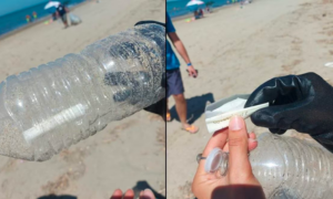 Trovato un messaggio misterioso in mezzo ai rifiuti: era dentro una bottiglia di plastica