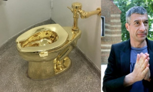 Il celebre water d'oro di Maurizio Cattelan venduto all'asta per 12 milioni di dollari